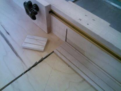 Use a cross cut sled to cut tenons to length as shown in photo #4. Loose tenons will also need to be made for the doors and the web frames.