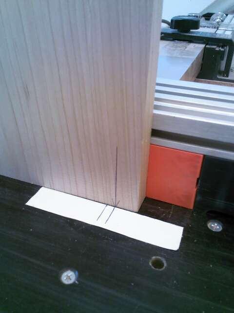 Once this divider is glued in place, size the other two vertical dividers and route those grooves.