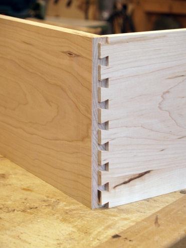The sides and back of the drawers are ½ thick, the front is ¾.