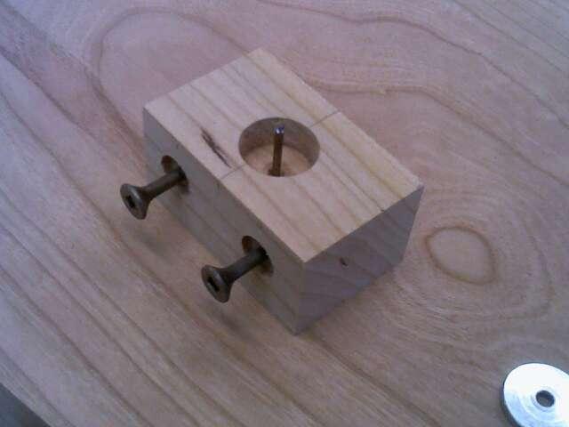 the magnet cup. Tap in a small finishing nail as shown in photo #1. Cut the head off the finishing nail.