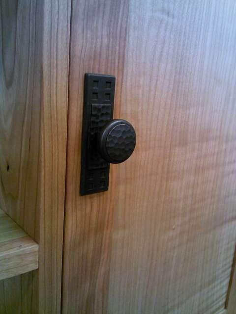 Drawer & Door Hardware Step #50: I used Arts & Crafts style door knobs and handles for this cabinet because they