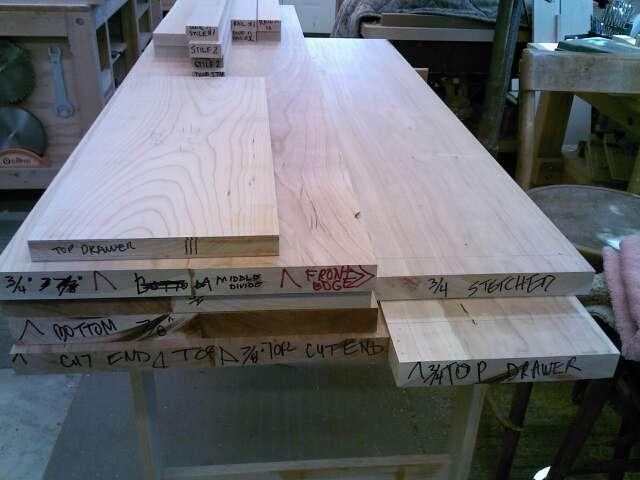 Lumber should be flat and have a square, straight edge to place against the table saw fence.