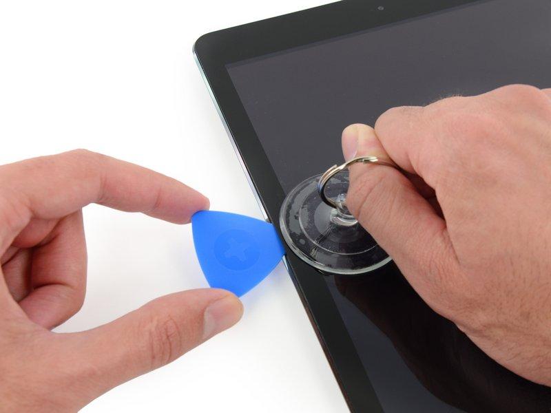If your ipad's screen is badly cracked, covering it with a smooth layer of clear packing tape may help the