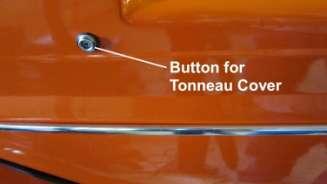 1164. Install the button for the tonneau cover tie down. 1165.