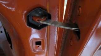 Install the door check rods with new seals,