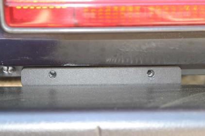 Remove the right rear tail light lens.