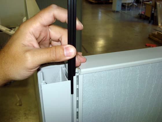 Note that all sides of pole have hinge channels for installation to panels.