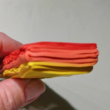 (see the blue clay) In this photo to the right, you can see that the medium color is flexible, the red and the yellow are a bit more dry, so they