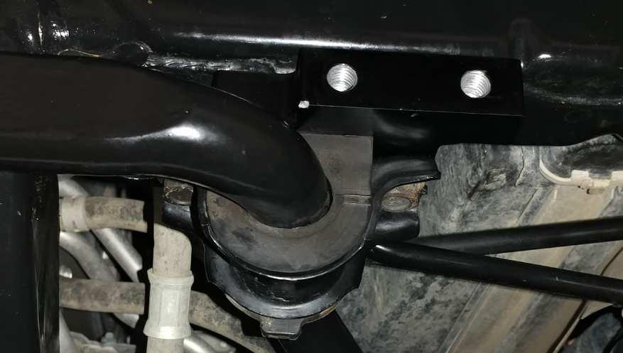 Then place these screws through the holes in the OE sway bar bracket and thread into the threaded holes in the