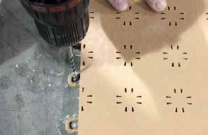 ANCHORING TILE ANCHORING TILE TO SUBSURFACE: Occasionally tile will shift after extended play. This is most common with courts that do not have rubber underlayment between the tile and subsurface.