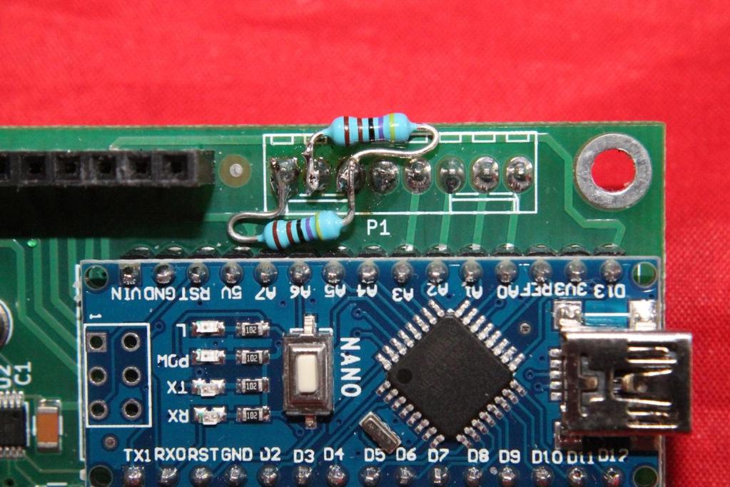 The above picture shows the two resistors soldered in place on the Raduino Board.