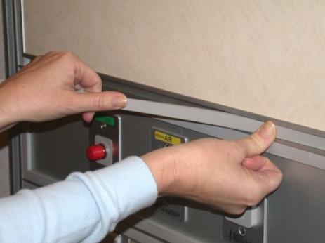 Be sure that the panel is centered within the opening or you will have difficulty re-installing the snap in trim.