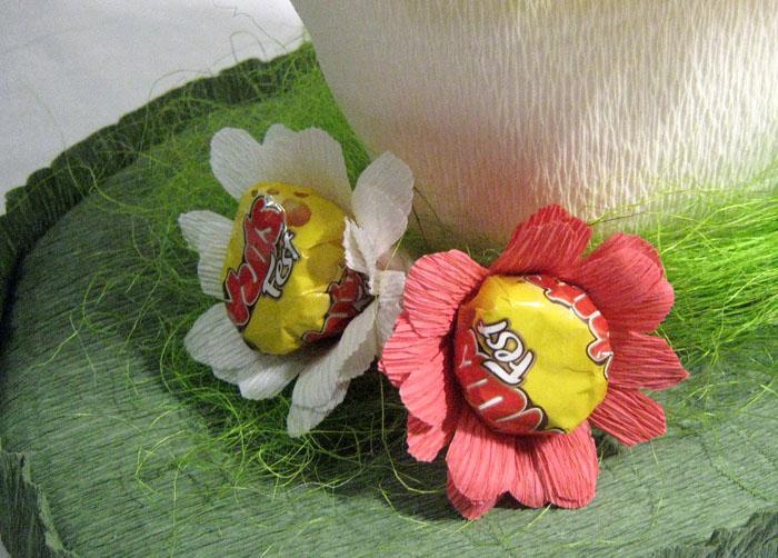 Wrap the strip of petals around the candy piece that is attached to a toothpick or a piece of wooden skewer.