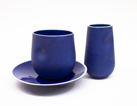 Kumo Cup and Minamo Saucer Japanese Porcelain, Ruri Iro Glaze, Sandblasted $130.00 Ame Flute Japanese Porcelain, Ruri Iro Glaze, Sandblasted 60 x 60 x 150 $78.