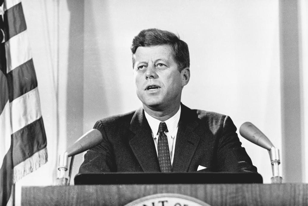 70222-ALMANAC-V1-1-186.qxd 10/5/04 7:30 AM Page 164 President John F. Kennedy, speaking before a joint session of the U.S. Congress on May 25, 1961.