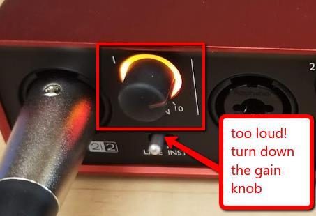 If the lights are displaying orange and red then it s too loud and you will need to turn down the gain knob for that input (1 or 2) If the display is consistently sitting at -20 or below you may need