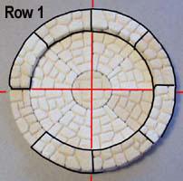 You'll want the plans labeled "4" Circular Fieldstone Plans". 1. We'll start by making a circular form to build around.