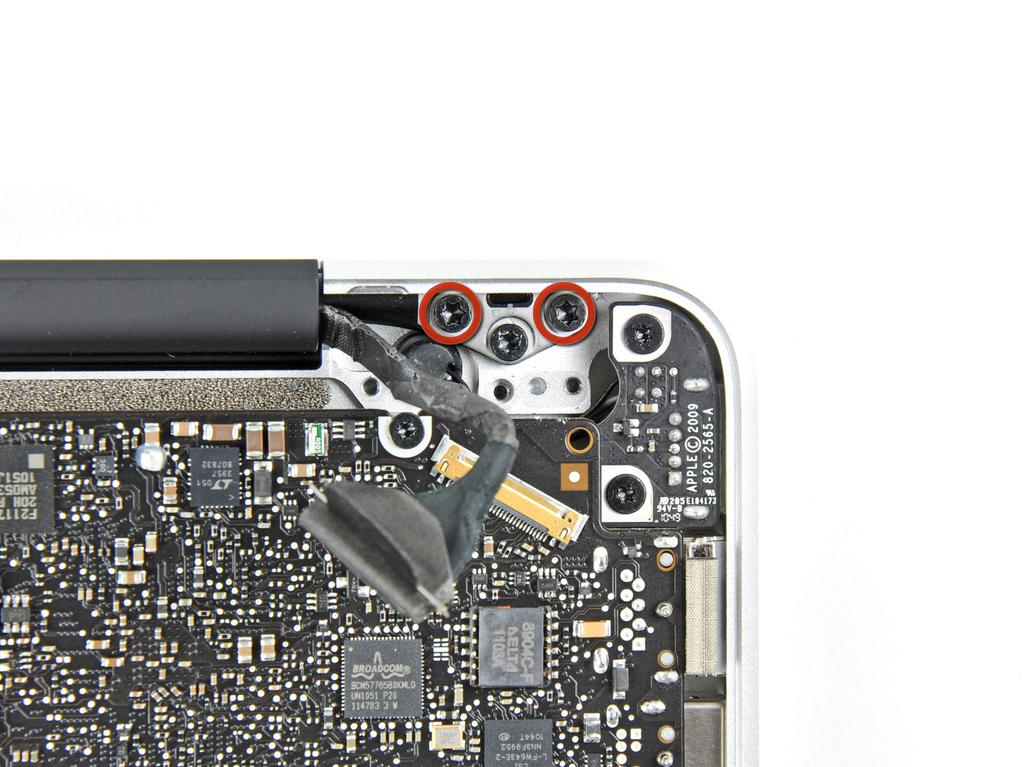 Step 17 Remove two of the three 6 mm T8 Torx screws securing the left side of the display to the upper case.