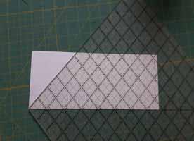 You will be cutting two 4 1/2" x 21" strips from each of the 25 fat eighths. This quilt block is constructed using 45 degree triangles.