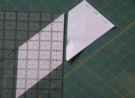 BUT if you don't have a 45 degree triangle ruler, that's okay. I will show you a fast and accurate way to cut the triangles needed for this block.
