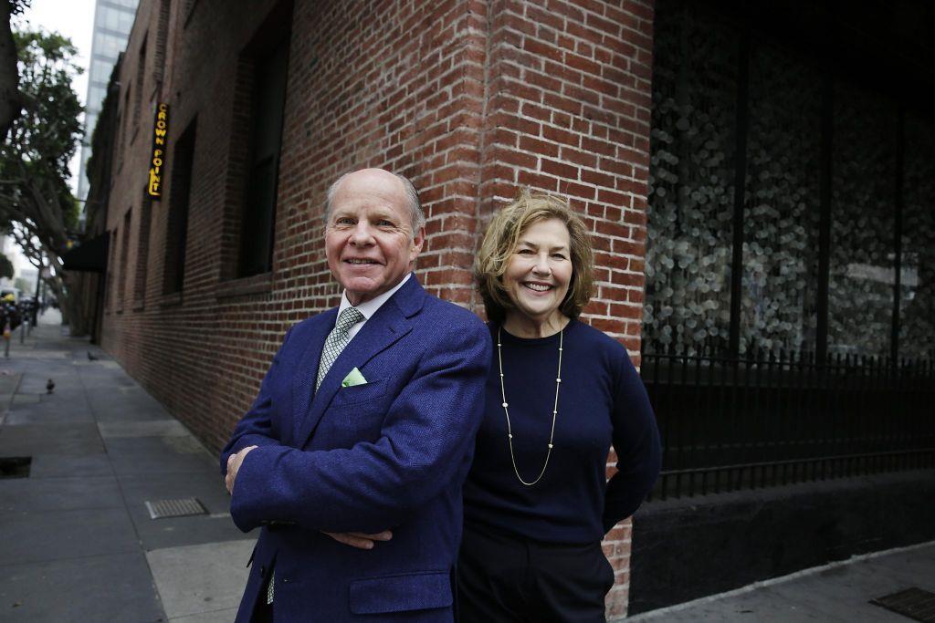 Image 5 of 6 John Berggruen (l to r) and Gretchen Berggruen stand outside the site of where their new