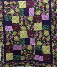 Make pin wheel blocks and star blocks then finish your quilt with borders which will make your quilt ready to be quilted.