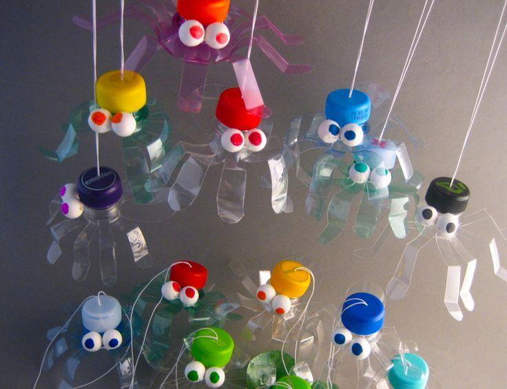 Using some string, plastic bottle tops and some careful scissor work on discarded clear plastic bottles you can create an army of colourful plastic jelly fish to hang up around your Centre.