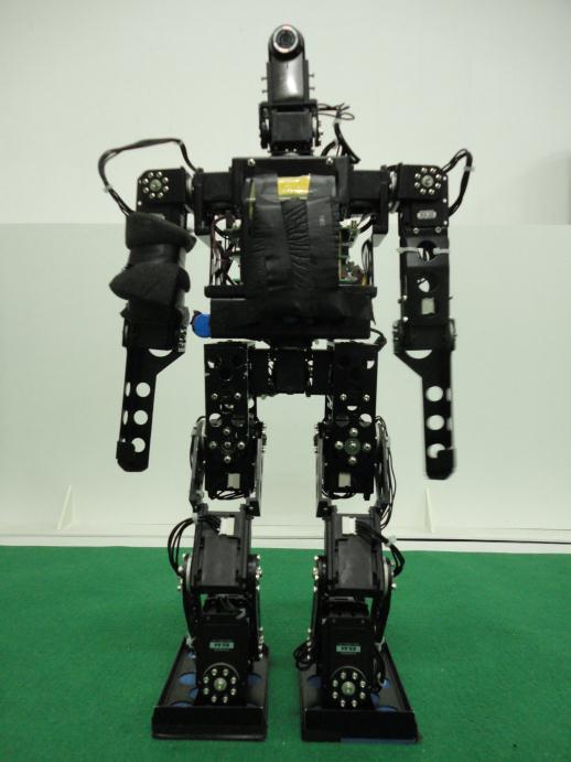 Fig. 1. Humanoid robot MOS2017 Our robot has twenty-one degrees of freedom (DOF): six in each leg, three in each arm, two in the neck and one in the waist.