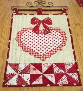 Our February raffle item is this adorable Valentine Mini Wall quilt donated by guild member Marilyn Suchecki Raffle tickets are 4/$1 and are available at the guild meeting.