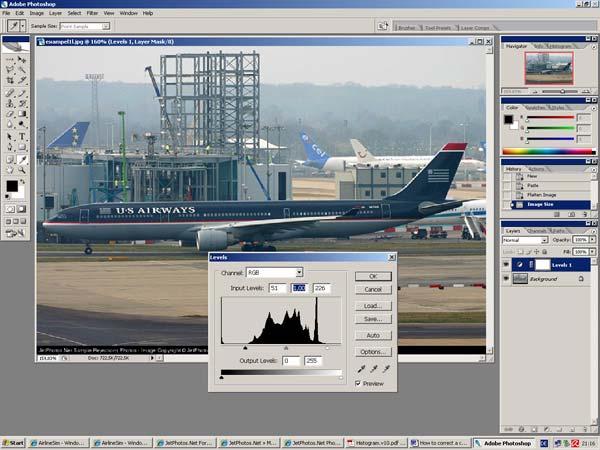 Now we will adjust the histogram by moving the sliders for black, 50% grey and white to make the photo look better.