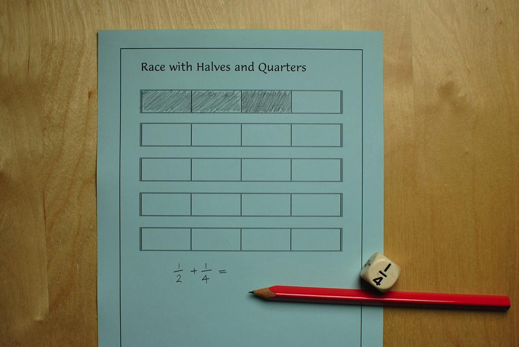 Race with Halves & Quarters (shading-in version) A demonstration video of the concrete (paper-folding) version of this game can be watched on YouTube.