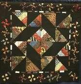 For example, if the quilt is wool applique, it must have 50% of its