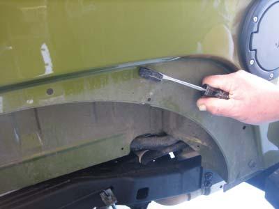 Rear Flare Installation Procedures (Driver s Side) 53 54 Using a pry tool, pliers,