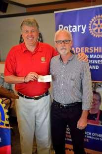 Michael presents another $3000 cheque from his coffee machine revenue, as you can see,