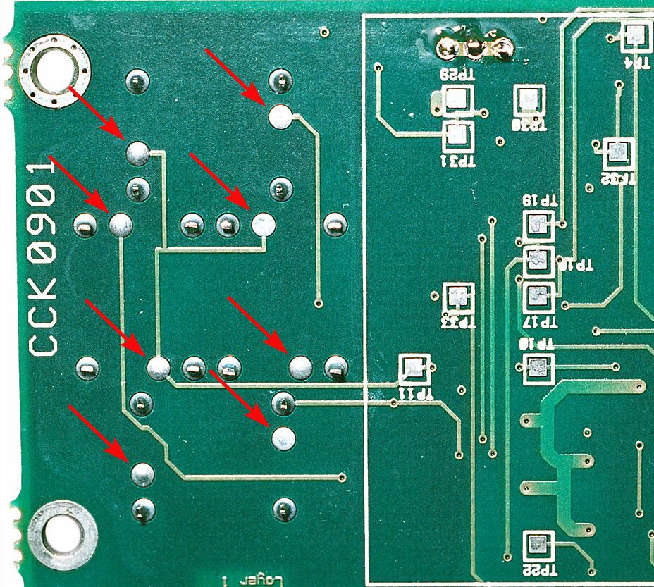8 Using a pair of fine pointed tweezers place the resistor pack over the display board resistor pads so that the edges of the resistor pack align with the pads, as shown below: Using tweezers again,