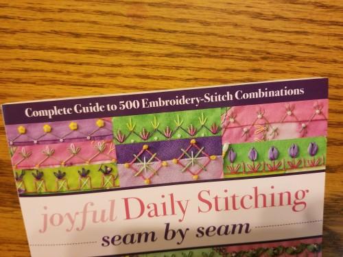 Check this out See that it says, Complete Guide to 500 Embroidery-Stitch Combinations. One of the first quilts I ever made was for Kelli when she was about three. It was her first bed quilt.