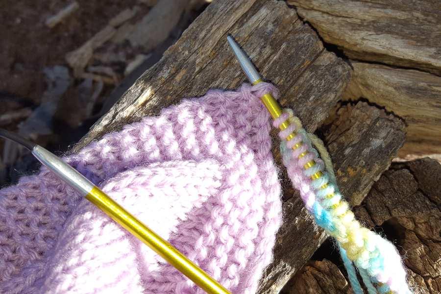 pull through the yarn to form a stitch.