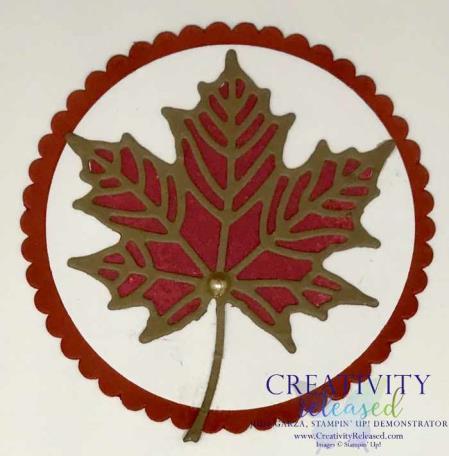 September Stamp the Colorful Seasons solid leaf with Cherry Cobbler on Whisper White. Punch with the 2 circle punch. Adhere to Cajun Craze SC.