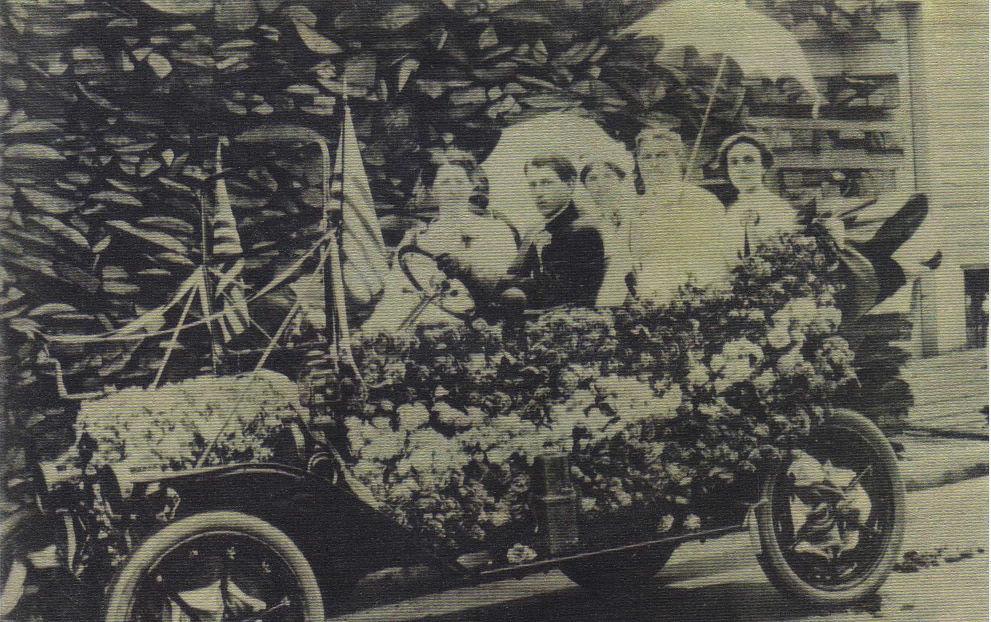 Ellen (Nellie) Kelland sitting in the front seat at the Rose Parade, Oregon.