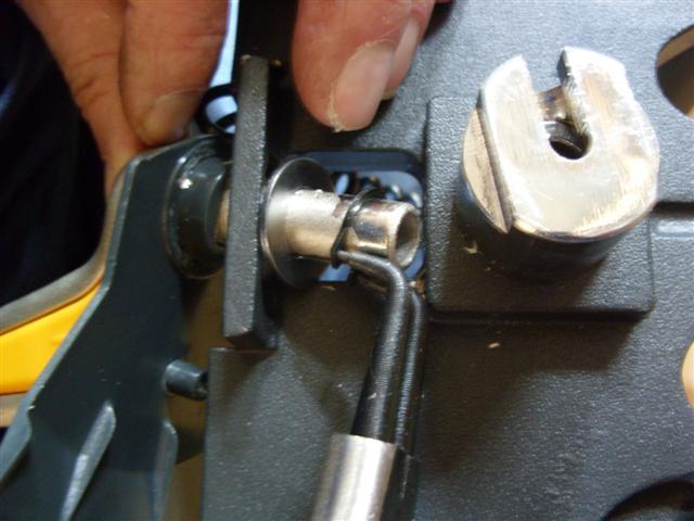 4/5 14) Remove the C-clip holding the increment weight pin to the top weight plate