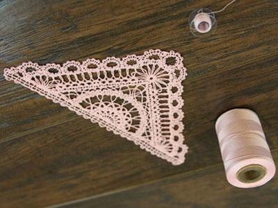 Once the lace is finished being embroidered, trim away the excess stabilizer, and soak the pieces to remove the rest of the stabilizer.
