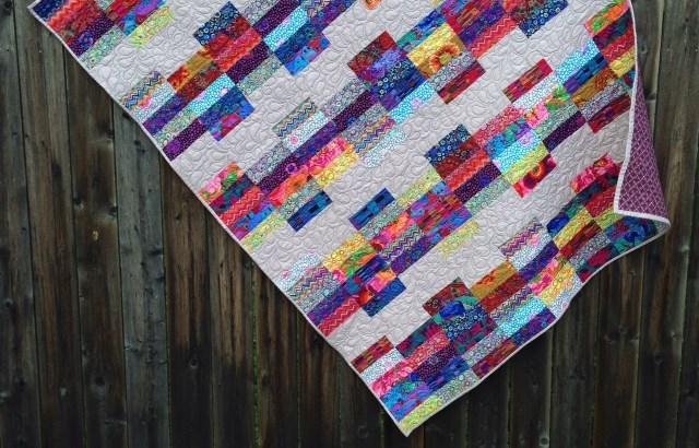 Strip Club offers an innovative quilt designs using 2 1/2 strips.