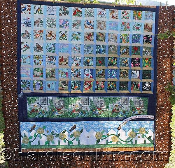This magnificent quilt shows a wide range of different kinds of birds.