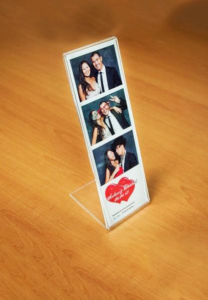 Add On Options: Frame Bonboniere They say two is a crowd and all of our Photo Booth services go hand in hand with these clear acrylic frames.