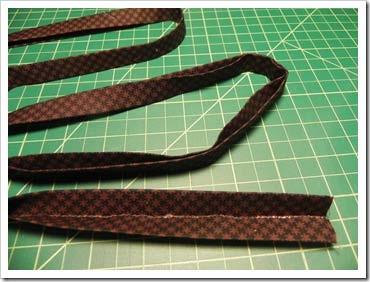 I used one uncut jelly roll strip for the bag strap.