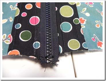 Now carefully sew the remaining front yoke onto the bottom of the bag front