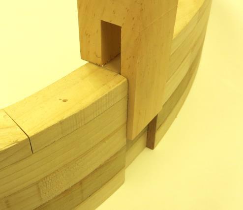 Remove the waste with saw and chisel until you get close, but do not go to the full depth. The next step is to fit the width of the rear of the leg to the dado edges.