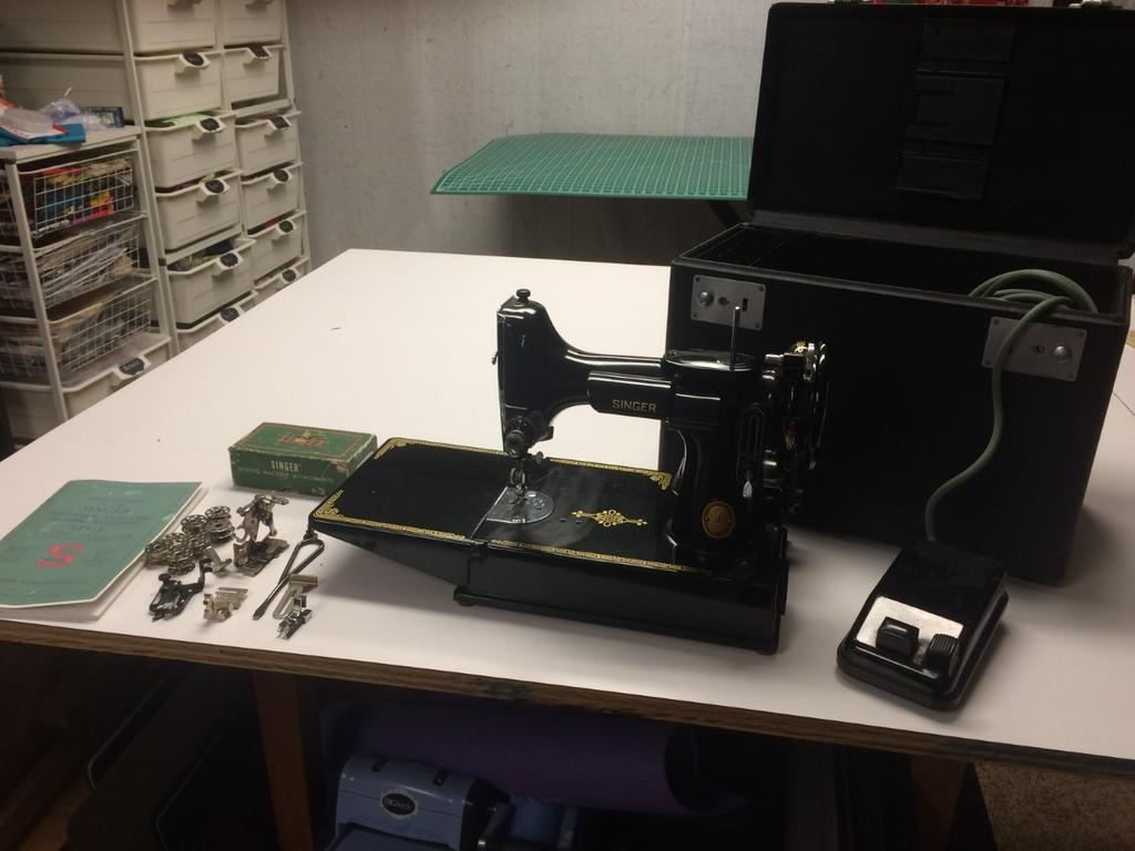 January 201 Sew It Goes 8 FOR SALE! Singer Featherweight 221, Year: 1952 Back case, 7 attachments/feet, foot pedal, 14 bobbins, 1 screwdriver, manual Works excellently.